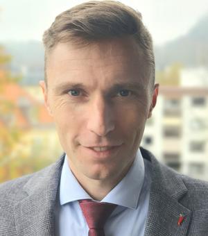 Headshot of Yevhenii Skok